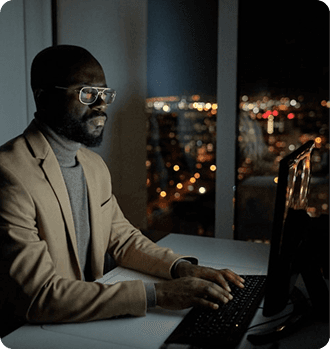 Team member working with analytics on a computer